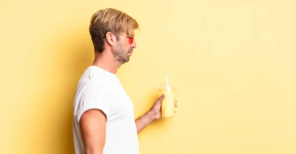 Blond Adult Man Profile View Thinking Imagining Daydreaming Milkshake — Stock Photo, Image