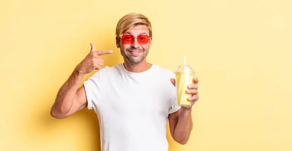 Blond Adult Man Smiling Confidently Pointing Own Broad Smile Milkshake — Stock Photo, Image