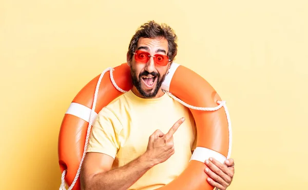 Expressive Crazy Man Looking Excited Surprised Pointing Side Life Guard — Stock Photo, Image