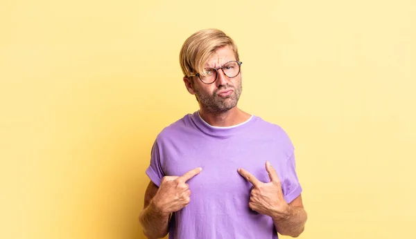 Handsome Blond Adult Man Pointing Self Confused Quizzical Look Shocked — Stock Photo, Image