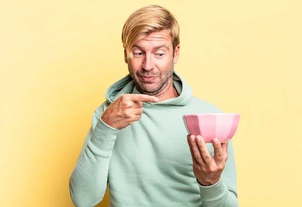 Blonde Handsome Adult Man Holding Empty Pot Yellow Wall — Stock Photo, Image