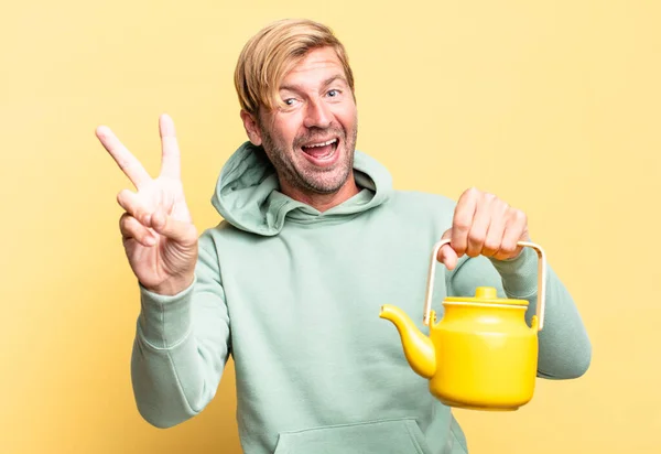 Blonde Handsome Adult Man Holding Teapot — Stock Photo, Image