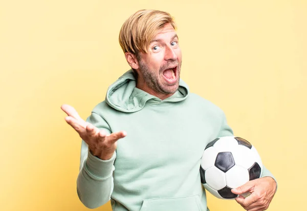 Blonde Handsome Adult Man Holding Soccer Ball — Stock Photo, Image