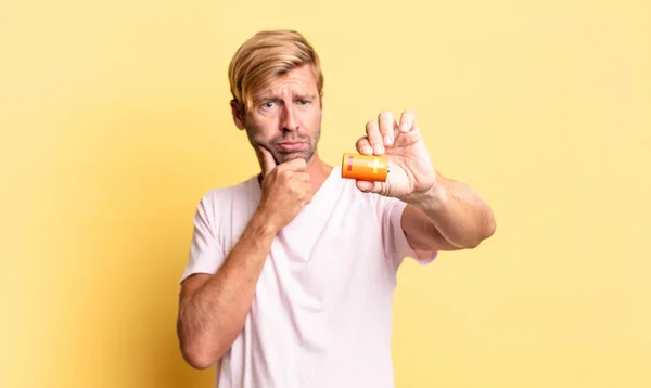 Blonde Handsome Adult Man Holding Batterie — Stock Photo, Image