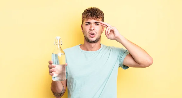 Young Handsome Man Feeling Confused Puzzled Showing You Insane Water — Stock Photo, Image