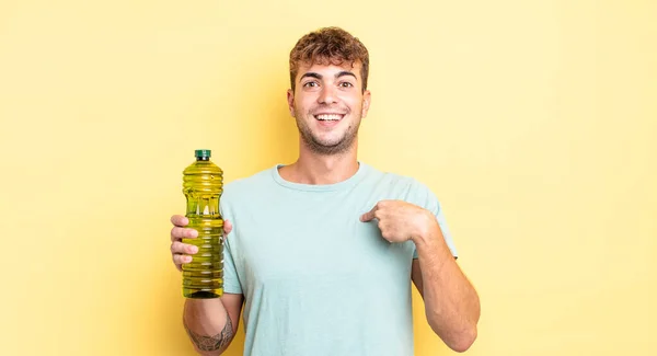Young Handsome Man Feeling Happy Pointing Self Excited Olive Oil — Stock Photo, Image