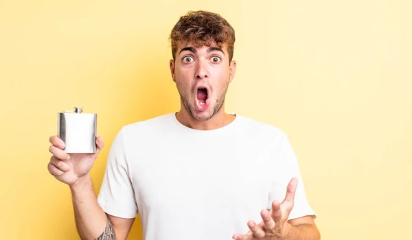 Young Handsome Man Amazed Shocked Astonished Unbelievable Surprise Alcohol Flask — Stock Photo, Image