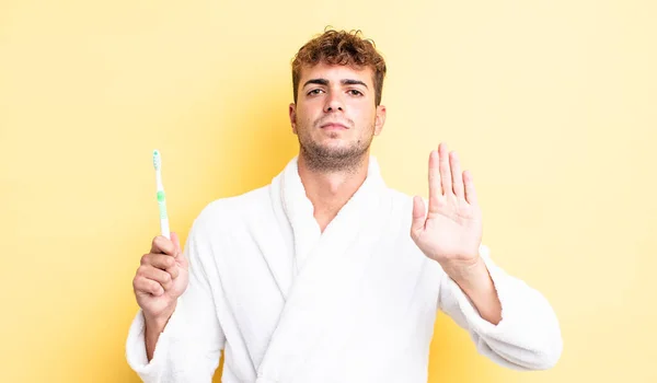 Young Handsome Man Looking Serious Showing Open Palm Making Stop — Stock Photo, Image