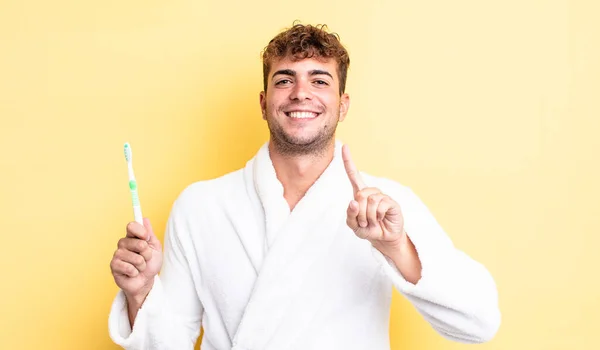 Young Handsome Man Smiling Proudly Confidently Making Number One Toothbrush — Stock Photo, Image