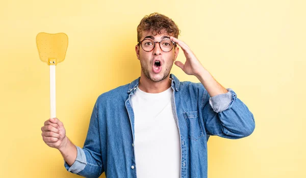 Young Handsome Man Looking Happy Astonished Surprised Flyswatter Concept — Stock Photo, Image
