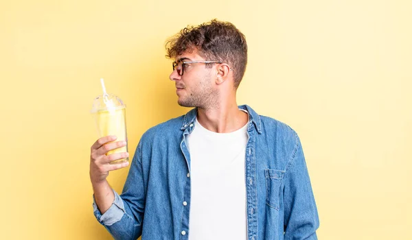 Young Handsome Man Profile View Thinking Imagining Daydreaming Milkshake Concept — Stock Photo, Image