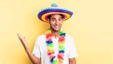 İspanyol yakışıklı adam kendini mutlu hissediyor, bir çözüm ya da fikir bulduğuna şaşırıyor. Meksika partisi konsepti