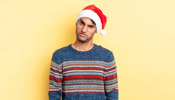 Hispanic Handsome Man Feeling Puzzled Confused Christmas Concept — Stock Photo, Image