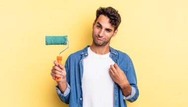 İspanyol yakışıklı adam kibirli, başarılı, pozitif ve gururlu görünüyor. paten boya kavramı