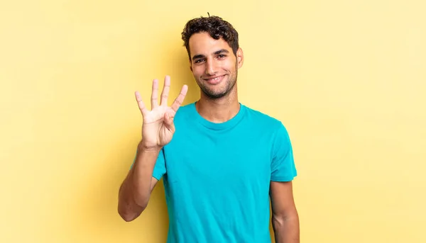 Hispanic Handsome Man Smiling Looking Friendly Showing Number Four — Stock Photo, Image