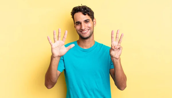 Hispanic Handsome Man Smiling Looking Friendly Showing Number Eight — Stock Photo, Image