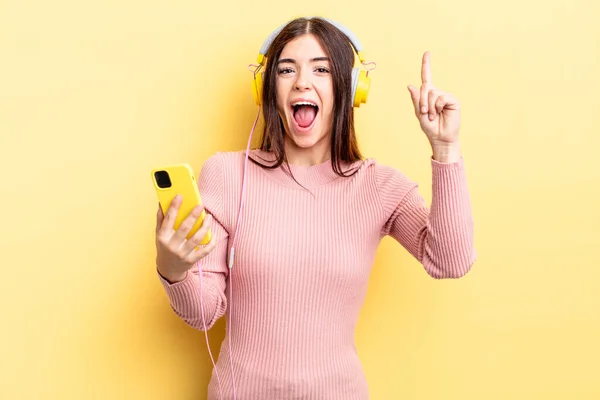Young Hispanic Woman Feeling Happy Excited Genius Realizing Idea Headphones — Stock Photo, Image