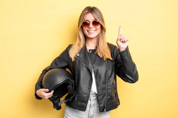 Pretty Blonde Girl Smiling Looking Friendly Showing Number One Motorbike — Stock Photo, Image