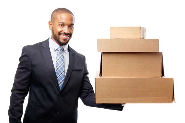 Jovem legal preto homem com cardboardboxes — Fotografia de Stock