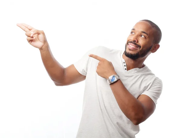 Young cool black man pointing — Stock Photo, Image