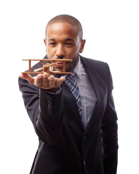 Hombre negro fresco joven con plano de madera — Foto de Stock