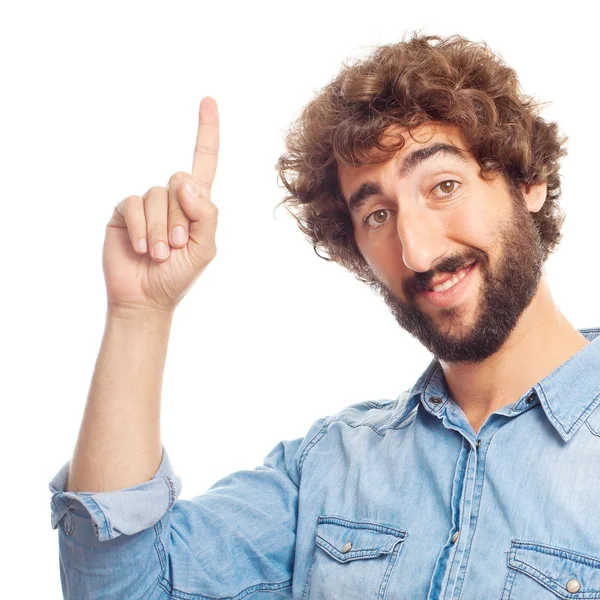 Joven loco apuntando hacia arriba — Foto de Stock