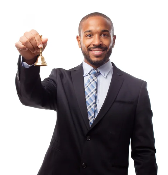 Young cool black man with a bell Royalty Free Stock Photos