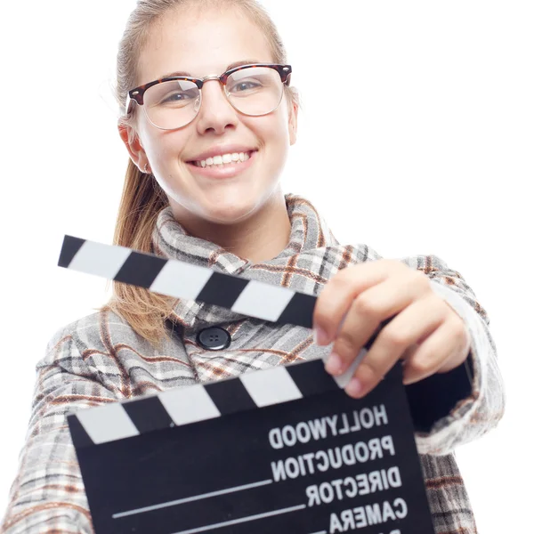 Joven cool mujer con un clapperboard —  Fotos de Stock