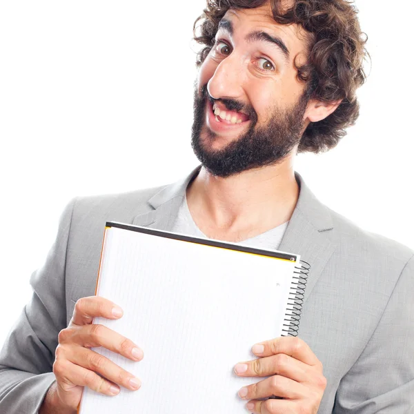 Young crazy man with a notebook — Stock Photo, Image