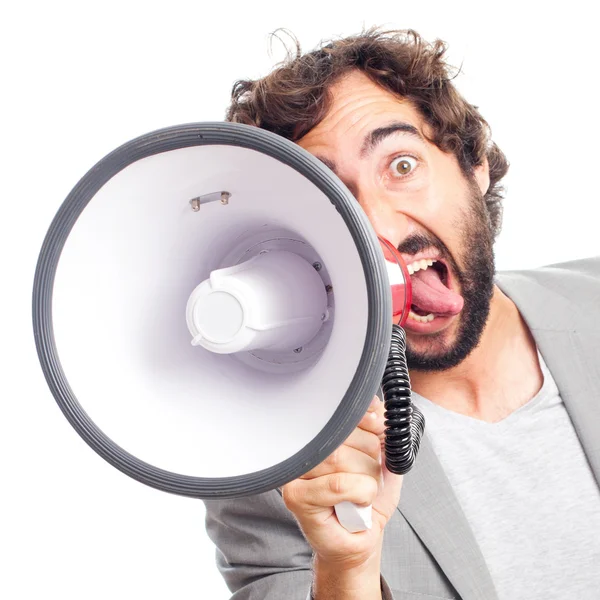 Šílený mladík křičí s megafon — Stock fotografie