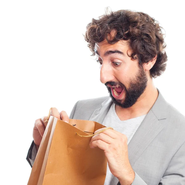 Joven loco con una bolsa — Foto de Stock