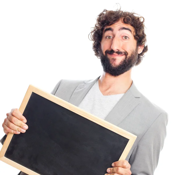 Gek jongeman met blackboard — Stockfoto