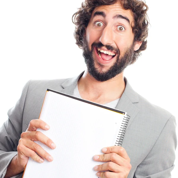 Joven loco con un cuaderno — Foto de Stock