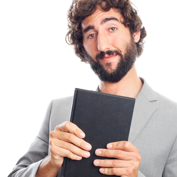 Joven loco con un libro — Foto de Stock