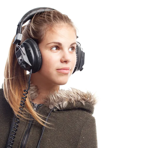 Young cool woman and headphones — Stock Photo, Image