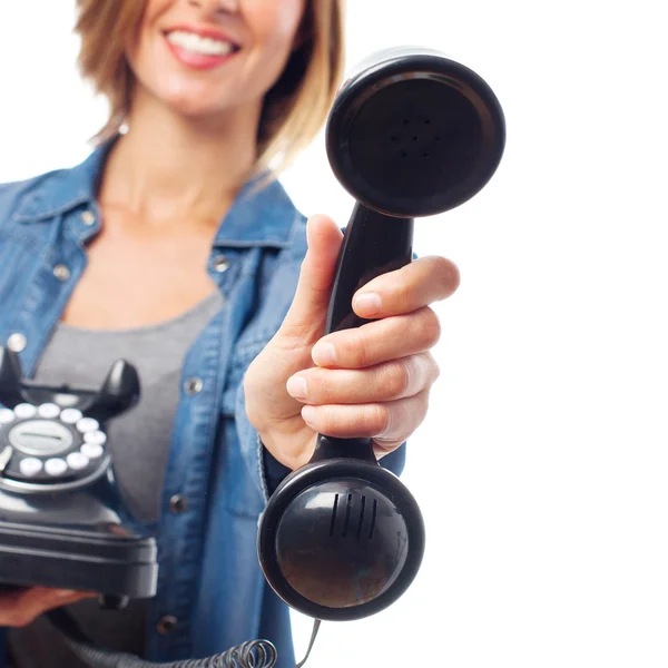 Joven guay mujer ofreciendo un teléfono —  Fotos de Stock