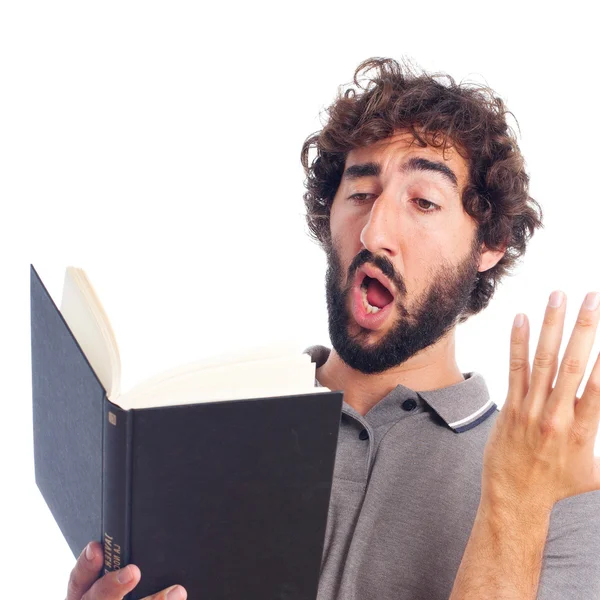 Joven loco interpretando con un libro —  Fotos de Stock