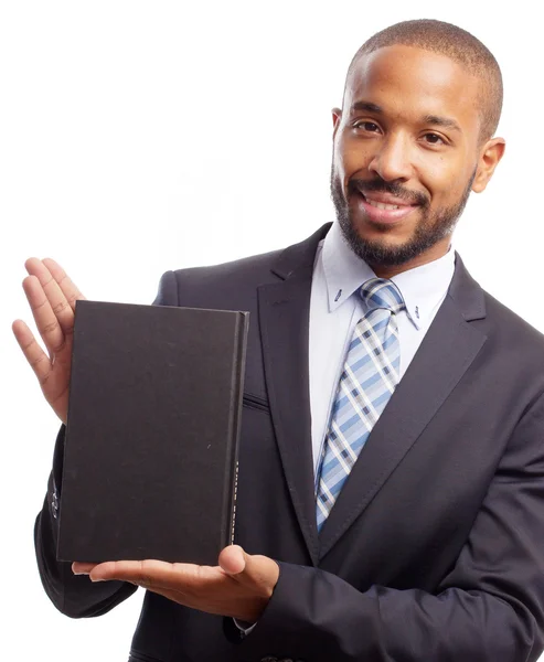 Young cool black man with a book — Stock Photo, Image