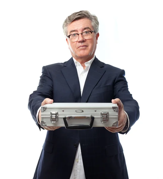 Senior cool man with a steel briefcase — Stock Photo, Image