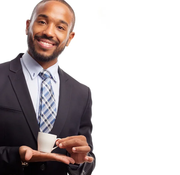 Молодой крутой чёрный человек, пьющий кофе — стоковое фото