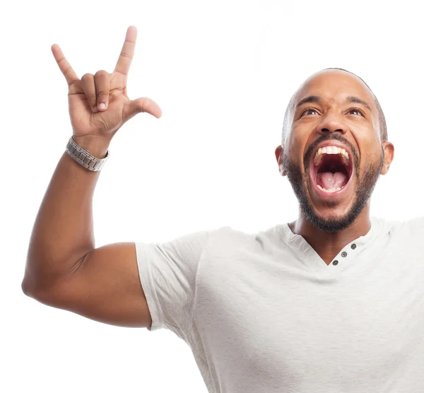 Joven fresco negro hombre celebrando signo — Foto de Stock