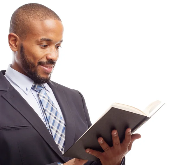 Young cool black man with a book — Stock Photo, Image