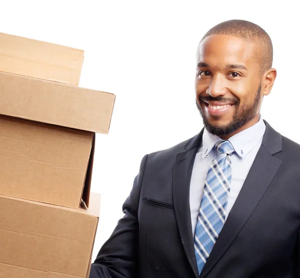 Jovem legal preto homem com cardboardboxes — Fotografia de Stock