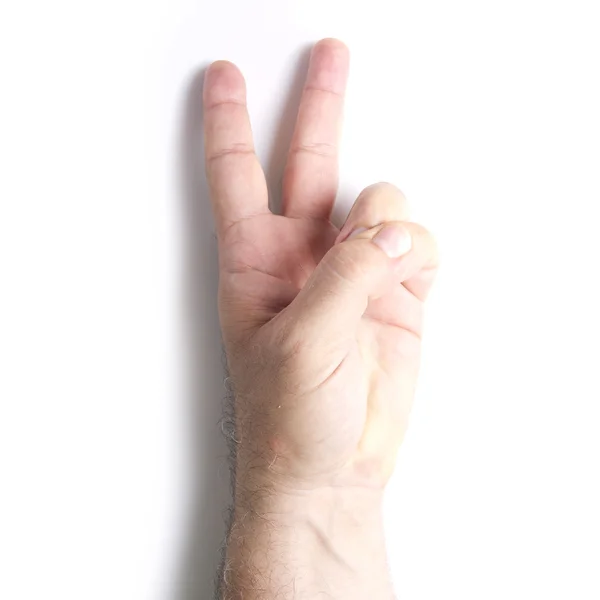 Mão de homem com gesto de paz — Fotografia de Stock
