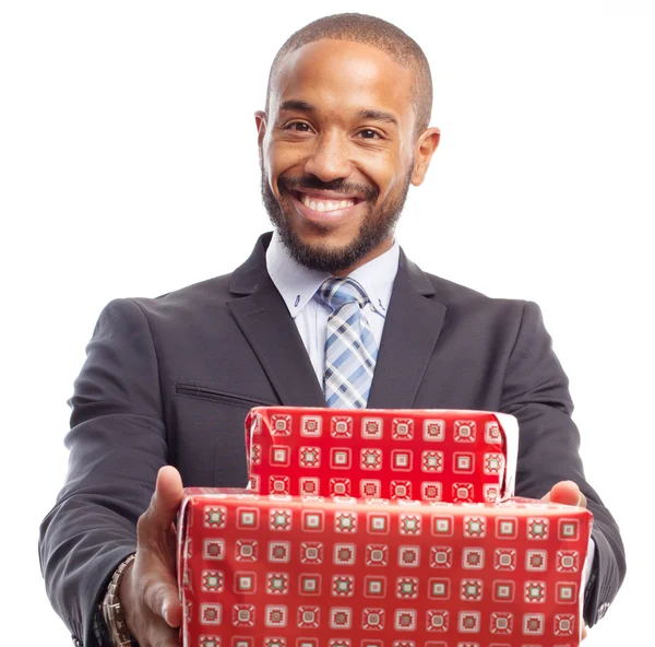 Young cool black man with boxes — Stock Photo, Image