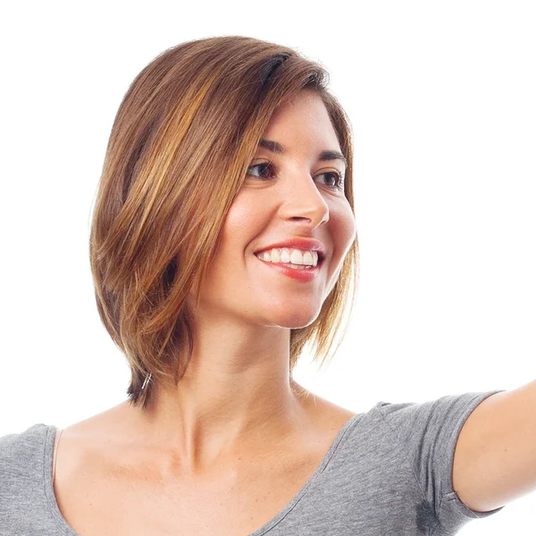 Young cool woman pointing — Stock Photo, Image