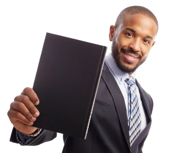 Joven fresco negro hombre con un libro — Foto de Stock