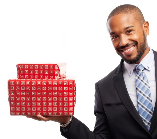 Young cool black man with boxes — Stock Photo, Image