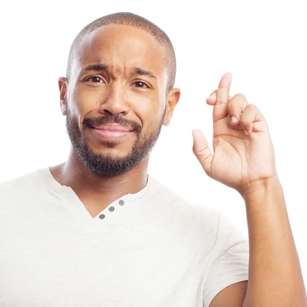 Jonge cool zwarte man vinger gekruist — Stockfoto