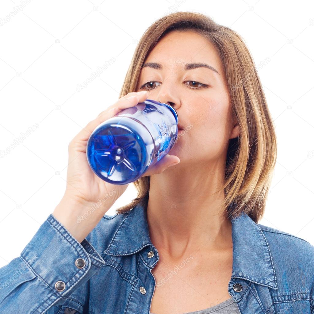 young cool woman drinking water